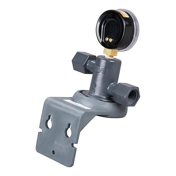 A grey 3M water filtration system with a black dial.