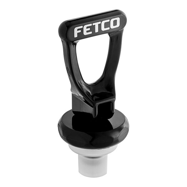 A black and white upper faucet assembly with black text reading "Fetco" on it.