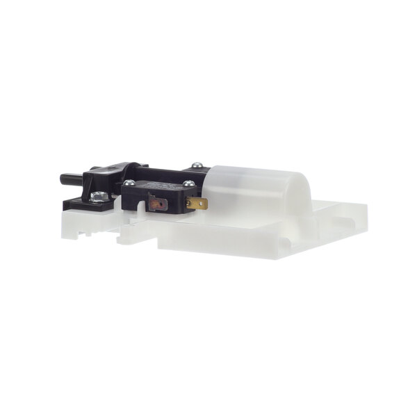 A white plastic Amana interlock switch assembly with black parts.