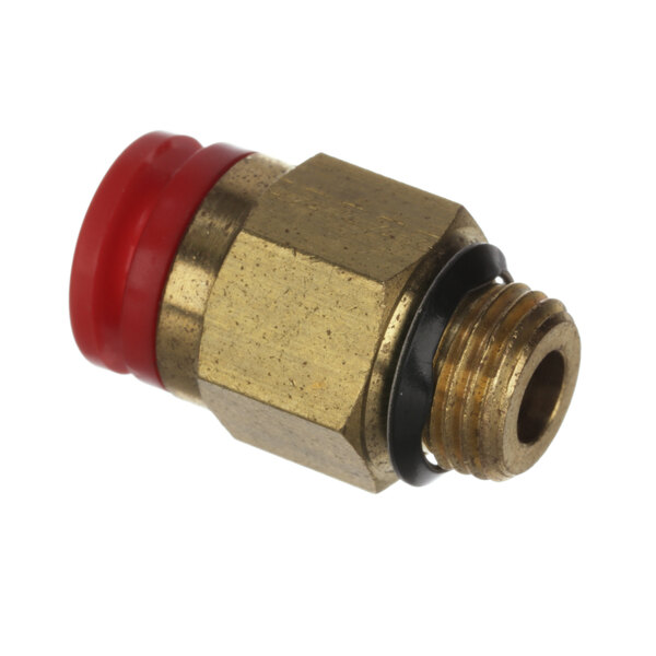 A close-up of a brass threaded pipe fitting with red and gold metal pieces.