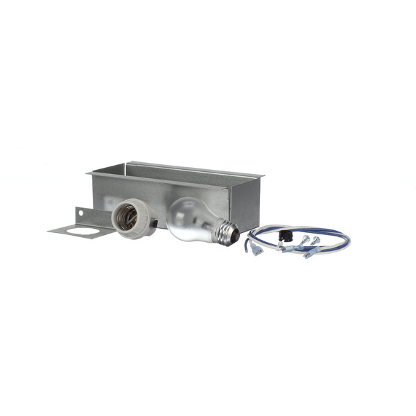 A metal light cover for a Victory refrigeration unit with a light bulb and wire.