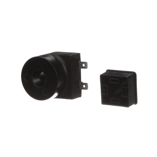 A black square Hobart valve coil with holes.