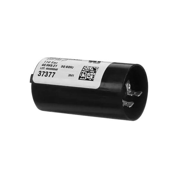 A black cylindrical capacitor with a white label.