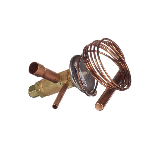A close-up of a Multiplex copper expansion valve with a copper pipe attached.