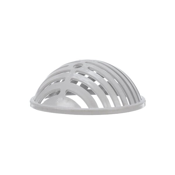 A white plastic Zurn dome strainer with holes in a circular design.