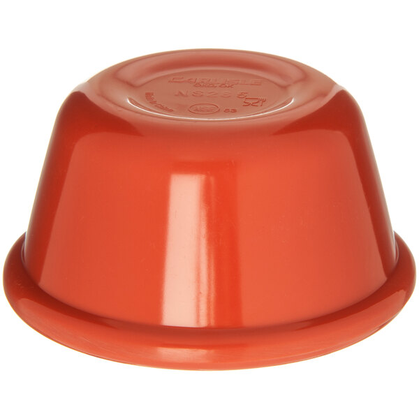 A Carlisle Sunset Orange smooth melamine ramekin with a lid.