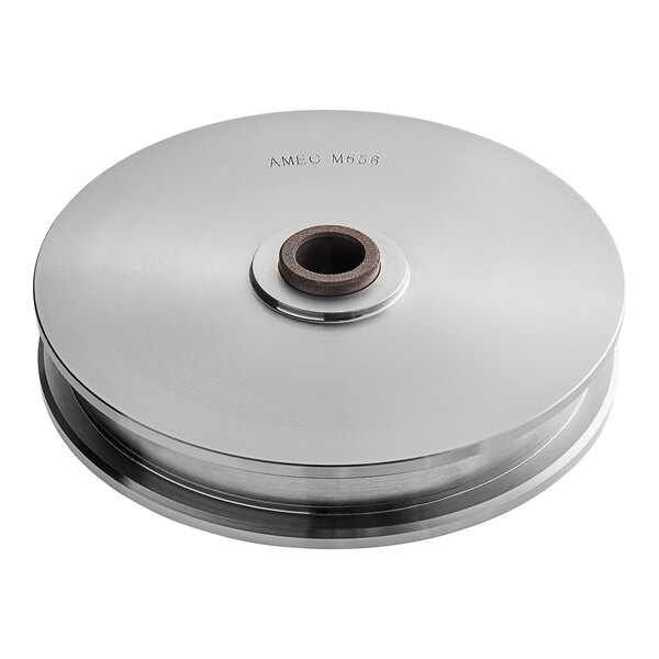 A round stainless steel metal Baxter wheel guide with a hole in the center.