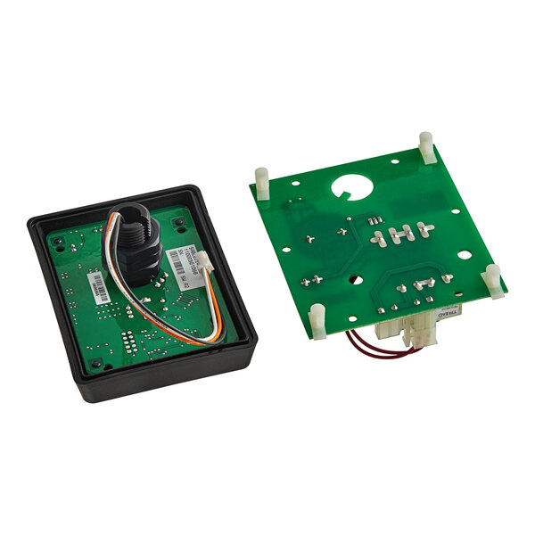 A green US Range digital timer circuit board with white wires.