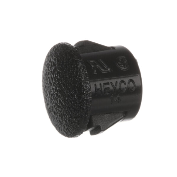 A close-up of a black plastic round object with the text "covv" on it.