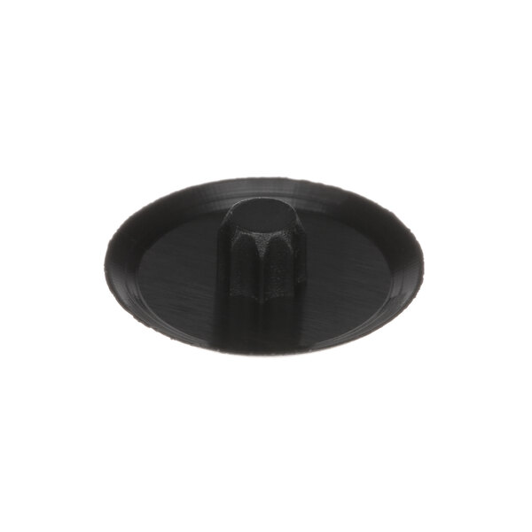 A close up of a black plastic square nut.