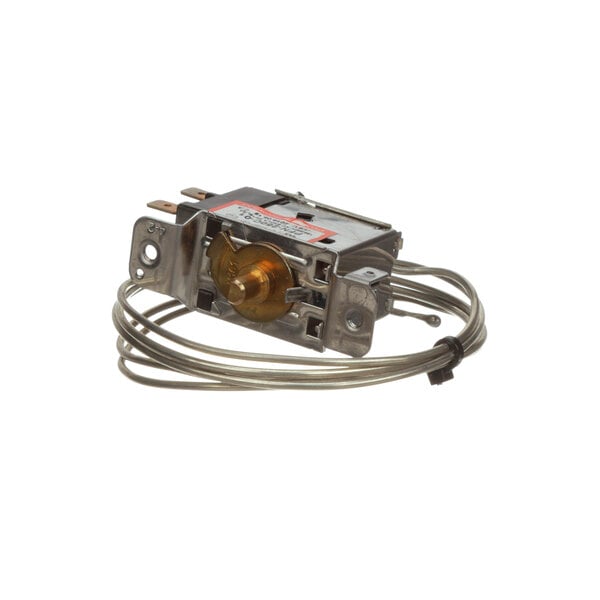 a small metal device with a gold knob
