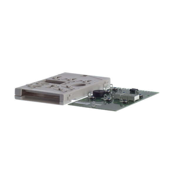The user interface board for an Electrolux convection oven. A white plastic object with a close-up of a small circuit board.