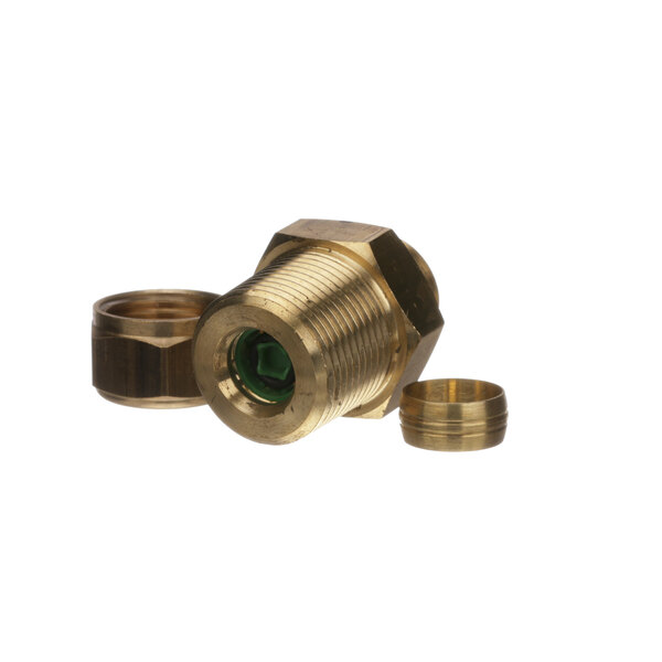 A brass Rinnai flow restrictor with green threads.