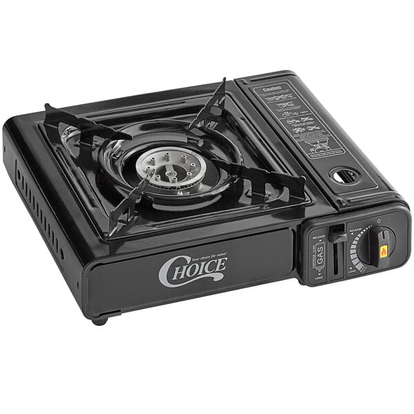 A black portable single-burner butane stove with control knobs and a metal grate for holding cookware.