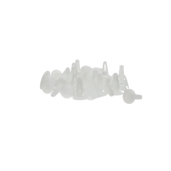 A pile of white plastic push pins.