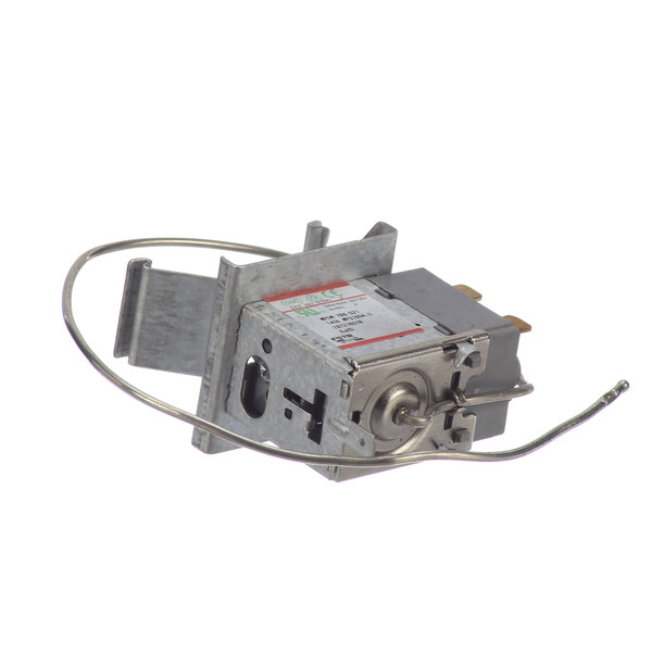 A small metal Kelvinator Cold Control with wires attached.