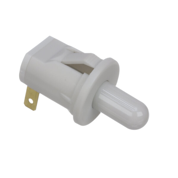 A close-up of a white plastic Kelvinator door switch.
