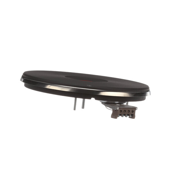 A black circular French plate with a metal base.