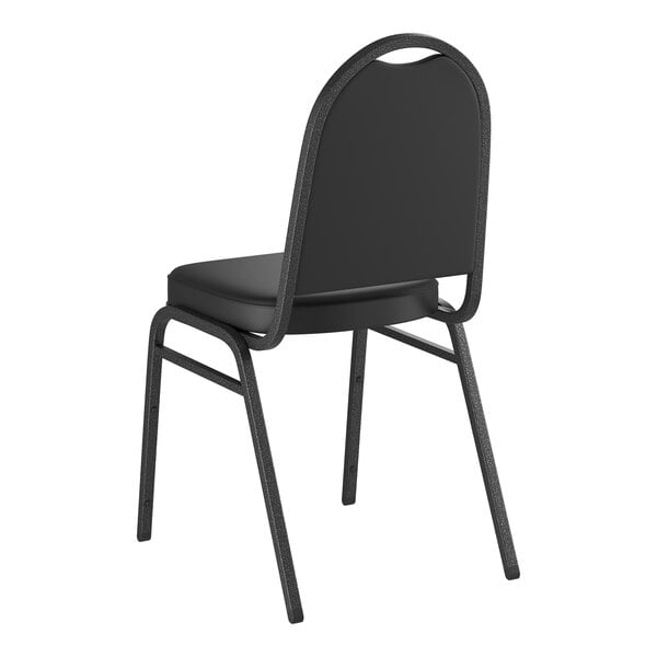A black stackable banquet chair with a 2-inch padded seat and a silver vein metal frame.