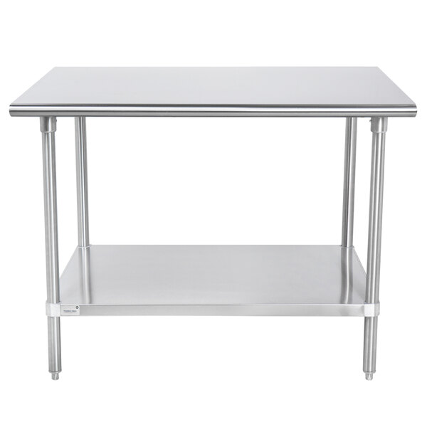An Advance Tabco stainless steel work table with undershelf.