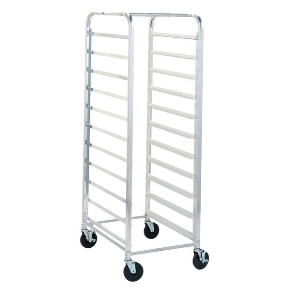 A Metro unassembled metal bun pan rack with wheels.