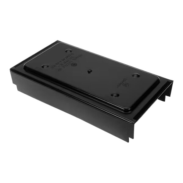 A black metal rectangular cover with holes.