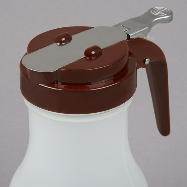 a white bottle with a brown lid