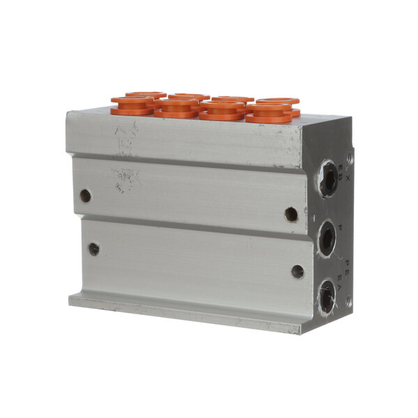 A metal block with four orange buttons.