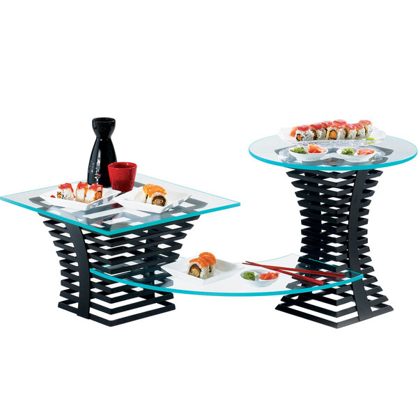 a table with plates of sushi