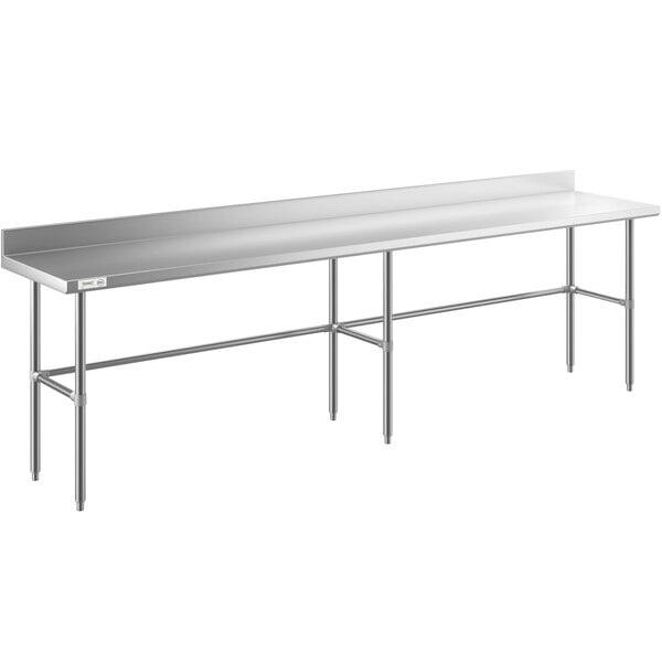 A Regency stainless steel open base work table with a backsplash on metal legs.