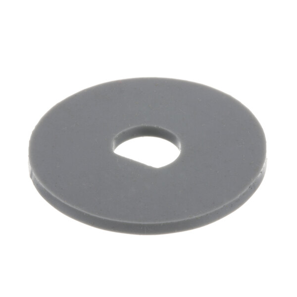 A grey rubber circle with a hole in it.