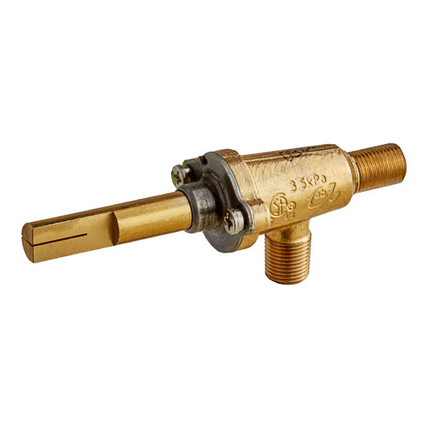 A close-up of a brass Vulcan gas valve with a gold and silver metal handle.