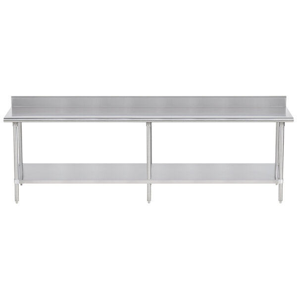 A long silver Advance Tabco work table with stainless steel undershelf.