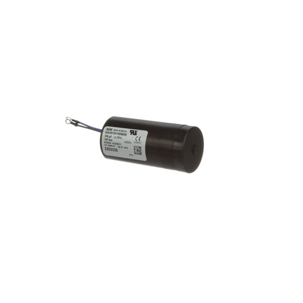 A black cylindrical Kelvinator capacitor with a white label.