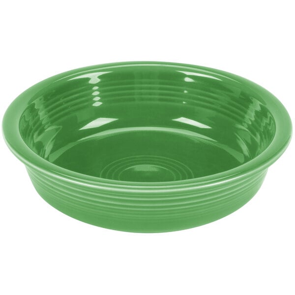 a green bowl with a ripple