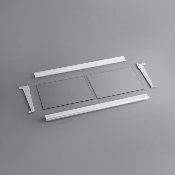 A white metal shelf with metal bars.