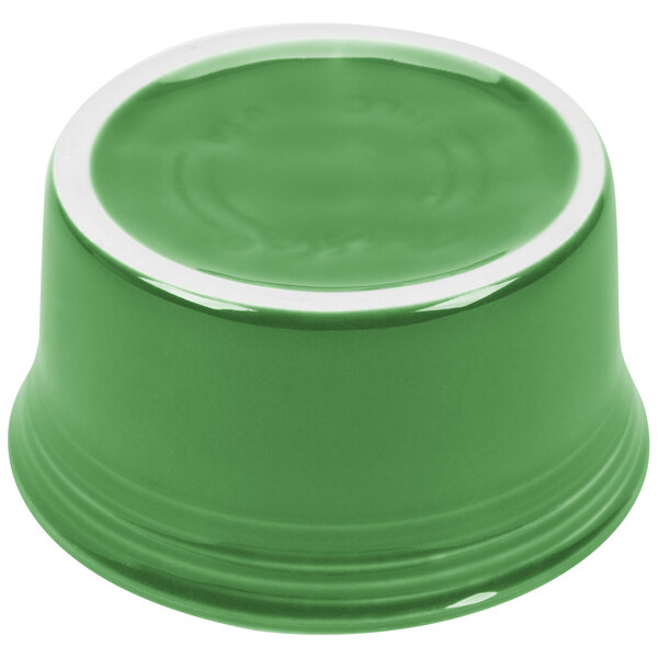 A green Fiesta ramekin with a white rim.