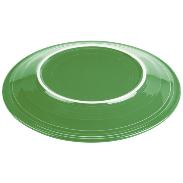 A green Fiesta® chop plate with a white rim.