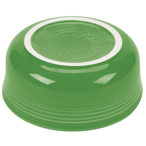 A green bowl with a white rim.