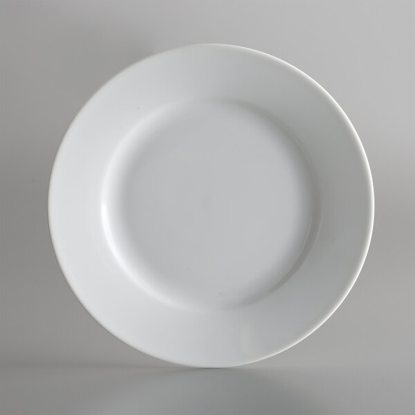 A close-up of a 10 Strawberry Street bright white porcelain salad/dessert plate with a white rim.