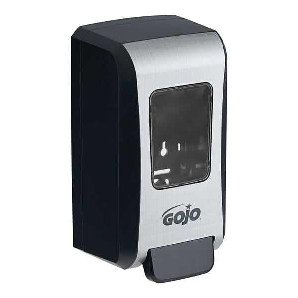 A black and silver GOJO manual soap dispenser with a black handle.