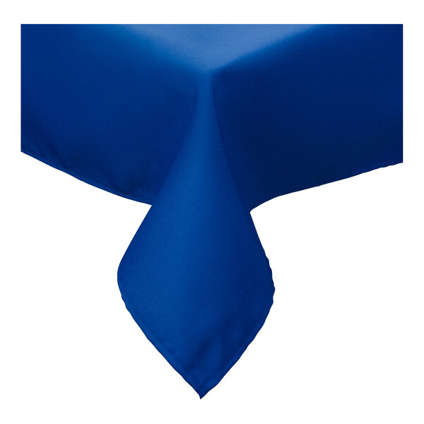 A folded royal blue Intedge tablecloth with a corner showing.