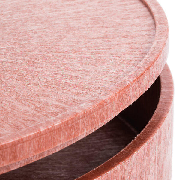 A pink polyethylene round tortilla server.