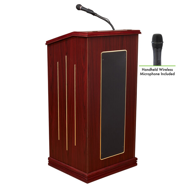 An Oklahoma Sound mahogany podium with a wireless handheld microphone.