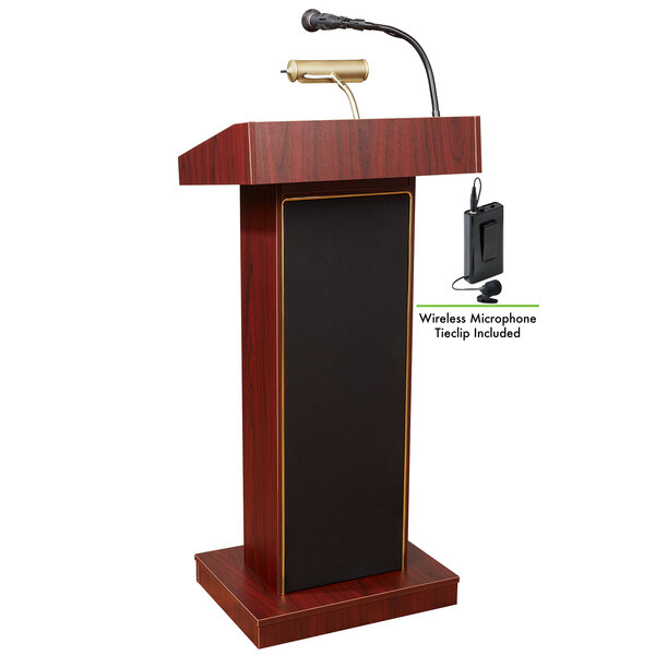 A mahogany podium with a wireless microphone and speaker.