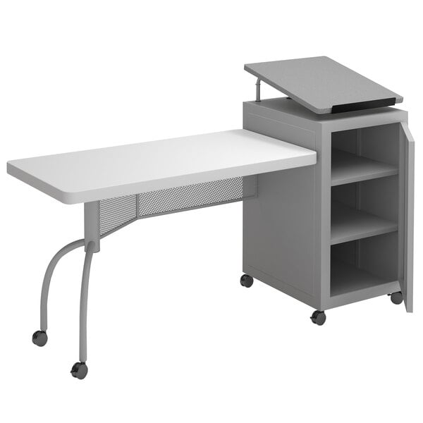 A gray Oklahoma Sound Edupod with a shelf and a drawer on wheels.