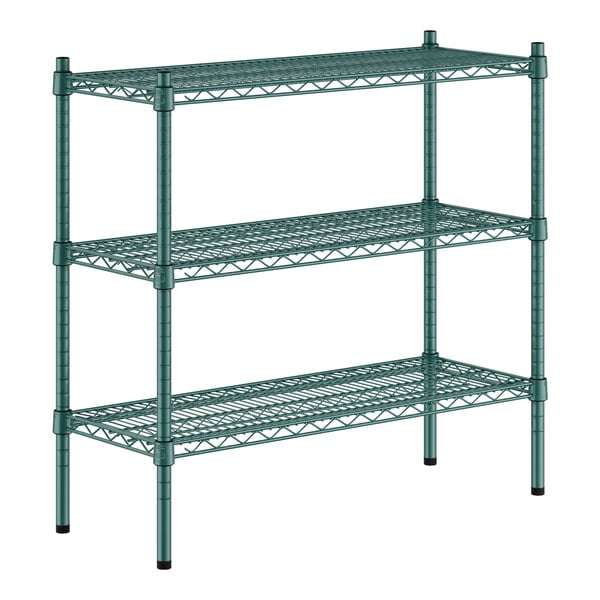 A green metal wire shelving unit with three shelves.