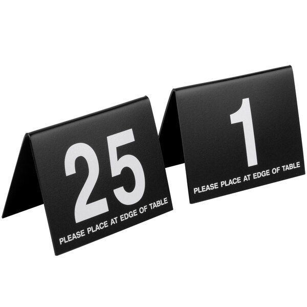 Two black Cal-Mil table number tents with white text reading "25" on them.