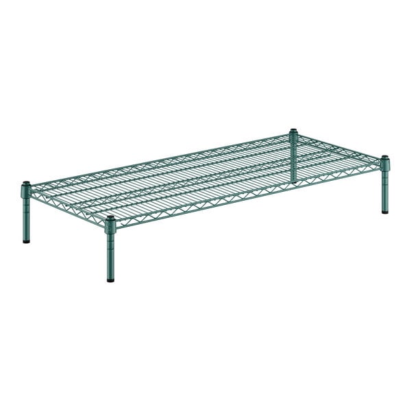 A green wire shelf from a Regency wire shelving kit.