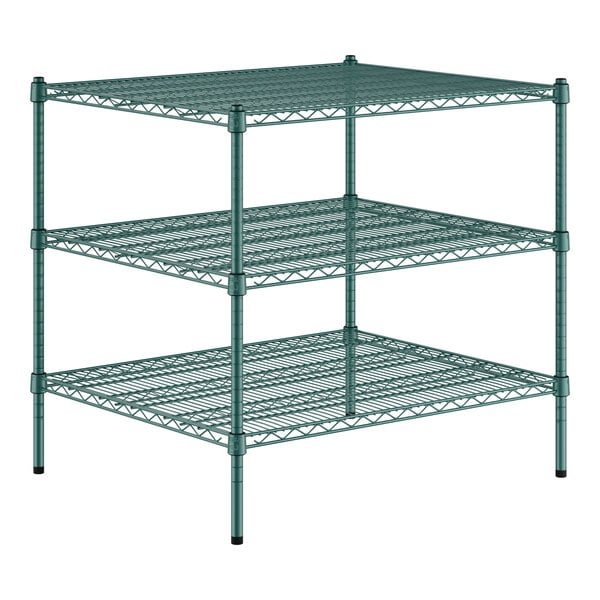 A green metal wire shelving unit with three shelves.